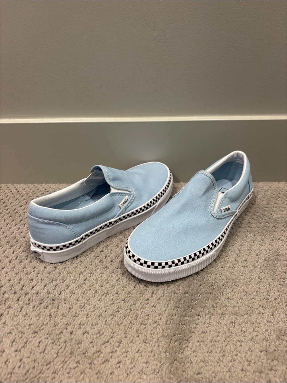 Vans Kids Slip-On Sneakers in Light Blue with Checkerboard Trim